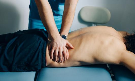 Person receiving a therapeutic massage